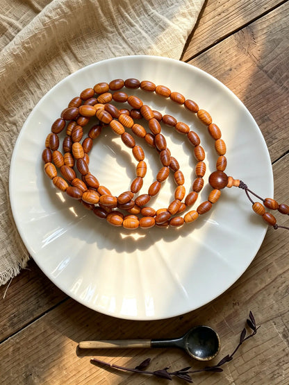 Grain-textured Thuja wood bead necklace