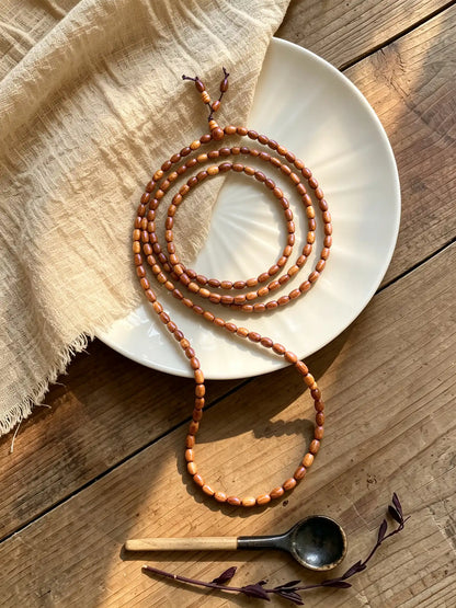 Grain-textured Thuja wood bead necklace