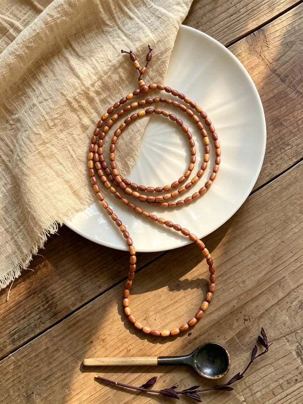 Grain-textured Thuja wood bead necklace